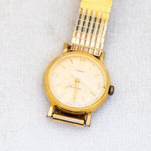 7 inch, Vintage Simplistic Round Gold Tone Watch by Timex - T25